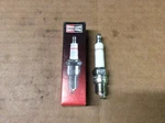 New Champion RV12YC Spark Plug - Qty. Fixed Price $9.35.