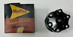 New Old Stock Distributor Cap For 1960-74 6-CYLINDER Models Mopar #1889424. Fixed Price $65.00.