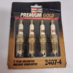 Nos Champion 2407-4 Gold Spark Plugs Pk.. Fixed Price $22.99.