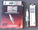 (4) Champion Spark Plugs RN12YC, 404 Usa Made, Nos. Fixed Price $14.95.